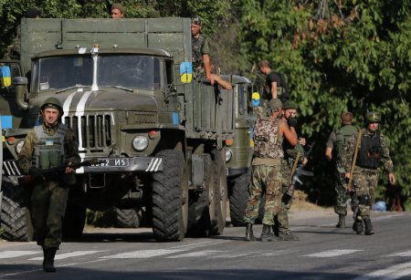 Путин: командование украинской армии приняло решение не выпускать своих вое ...