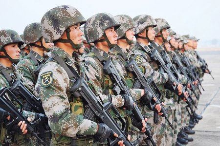 СМИ: Китай перебрасывает в Сирию технику и солдат