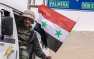 Освобожденная Пальмира: Российские военные, сброшенные флаги ИГИЛ и цветы н ...