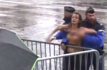 Участница Femen выбежала на дорогу перед кортежем Трампа